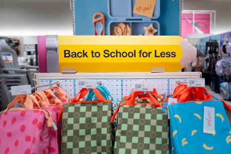 An array of vibrant lunchbox bags in various colors and patterns are displayed together.