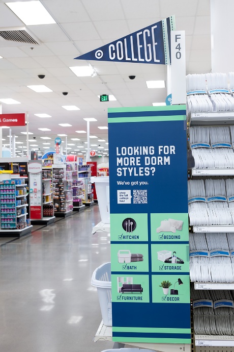 A college-themed pennant hangs from a shelf at Target.