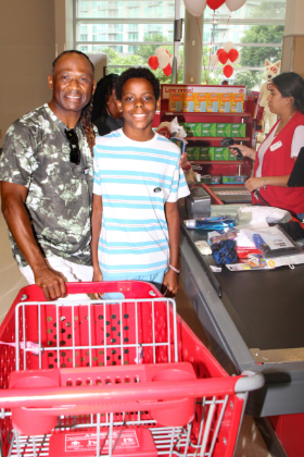 A Big and Little pair checkout at Target after a successful back-to-school shopping trip.