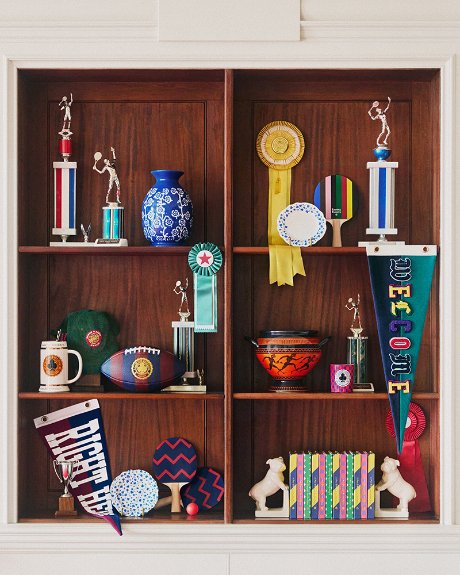 A shelf displays pieces from the Rowing Blazers x Target collection.