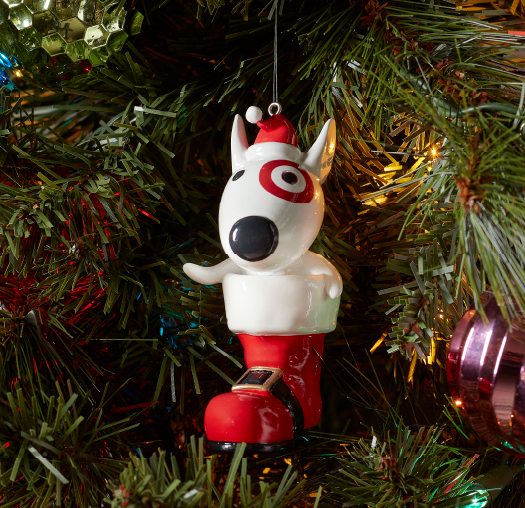 A Bullseye Dog ornament on a tree.